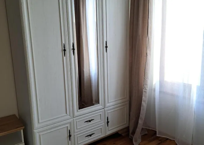 Megi Apartments, Sity